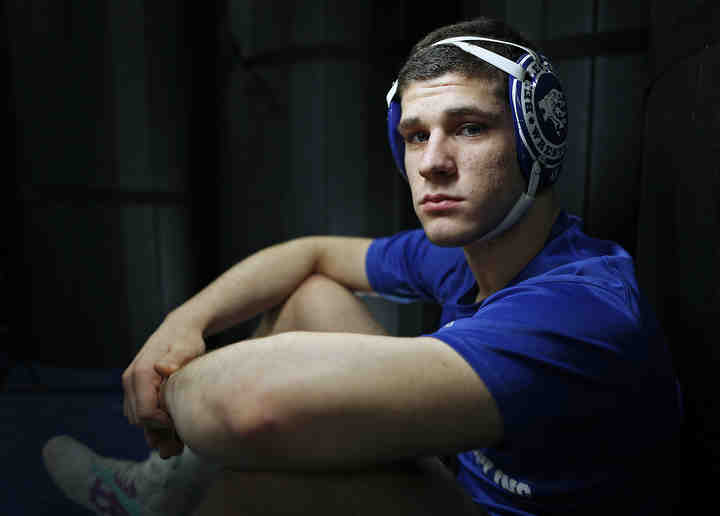 Bexley wrestler Eliot Clark heads into the state tournament with an undefeated 43-0 record.      (Kyle Robertson / The Columbus Dispatch)